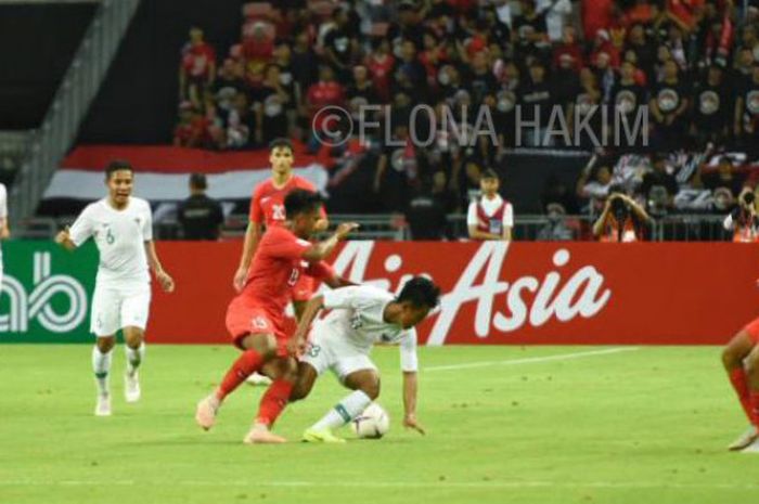  Pertandingan antara tim nasional Singapura dan Indonesia pada laga perdana Grup B Piala AFF 2018 di Stadion Nasional, Jumat (9/11/2018).  