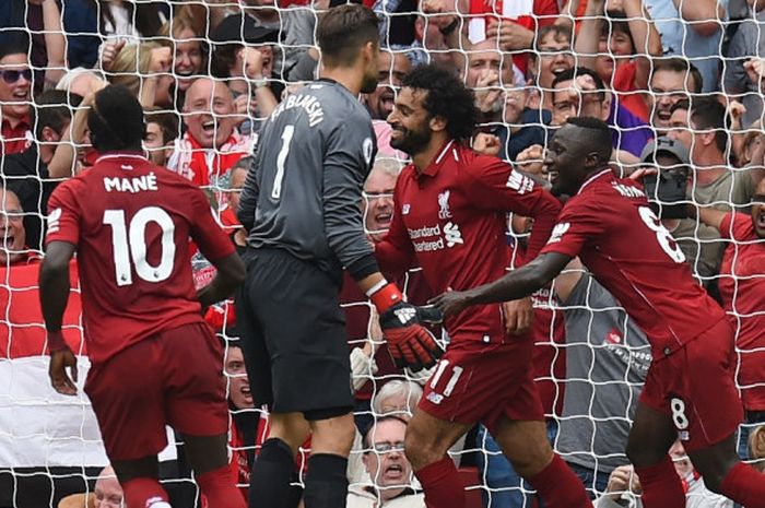 Pemain Liverpool melakukan selebrasi setelah mencetak gol ke gawang West Ham United pada laga pertama Liga Inggris musim 2018-2019 di Stadion Anfield, Minggu (12/8/2018) malam WIB.