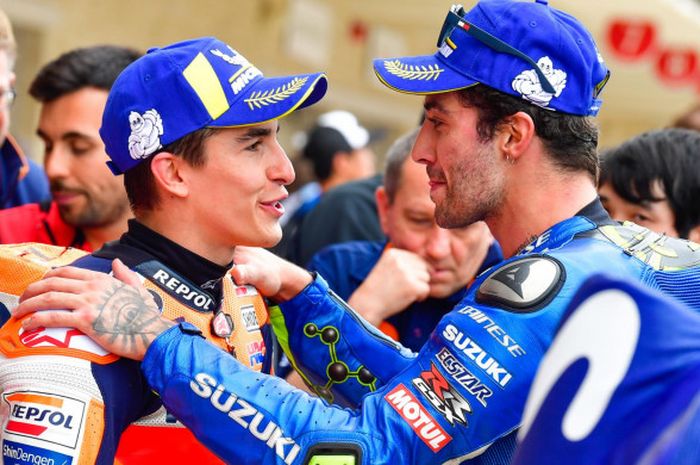 Mantan pembalap MotoGP, Andrea Iannone (kanan), yakin Marc Marquez bakal meramaikan persaingan setelah bergabung dengan tim satelit Ducati, Gresini.