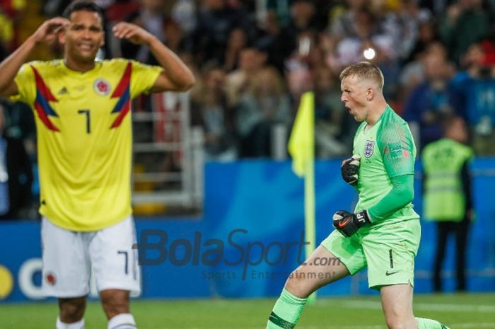 Ekspresi kiper timnas Inggris, Jordan Pickford, saat berhasil menepis penalti pemain Kolombia, Carlos Bacca, pada laga babak 16 besar Piala Dunia 2018 di Spartak Stadium, Selasa 3 Juli 2018.