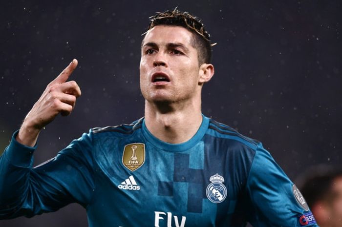 Megabintang Real Madrid, Cristiano Ronaldo, merayakan gol yang dicetak ke gawang Juventus dalam laga leg pertama perempat final Liga Champions di Stadion Allianz, Turin, Italia pada 3 April 2018.