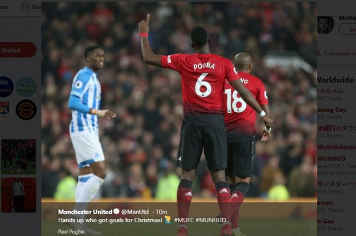 Gelandang Manchester United, Paul Pogba, merayakan gol ke gawang Huddersfield Town, dalam laga pekan ke-19 Liga Inggris di Stadion Old Trafford, Rabu (26/12/2018)