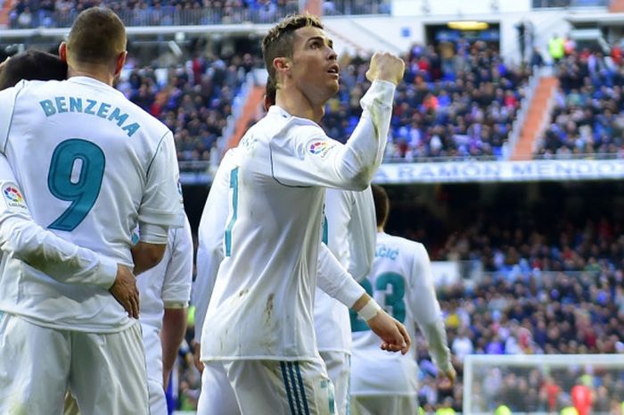 Cristiano Ronaldo merayakan golnya pada laga Real Madrid kontra Deportivo Alaves di Santiago Bernabeu, Sabtu (24/2/2018).