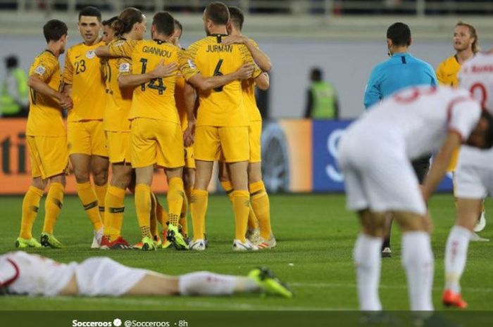 Para pemain Australia merayakan kemenangan atas Suriah pada laga penutup fase grup Piala Asia 2019.
