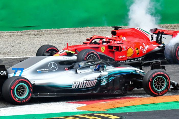 Sebastian Vettel dan Lewis Hamilton terlibat insiden di tikungan 4 lap pertama pada balapan GP Italia di Sirkuit Monza, Italia, Minggu (2/9/2018).
