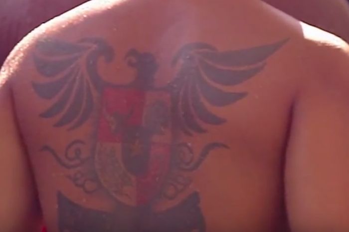 Tatto bergambar garuda pancasila milik atlet polo air putra, Benny Respati.