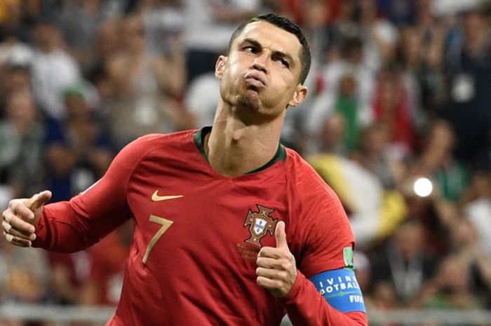    Ekspresi megabintang Portugal, Cristiano Ronaldo, dalam laga Grup B Piala Dunia 2018 kontra Iran di Mordovia Arena, Saransk, Rusia pada 25 Juni 2018.   