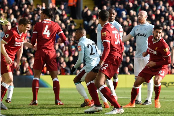 Momen Emre Can mencetak gol pembuka Liverpool pada laga lanjutan Liga Inggris di Stadion Anfield, Sabtu (24/2/2018) malam WIB.