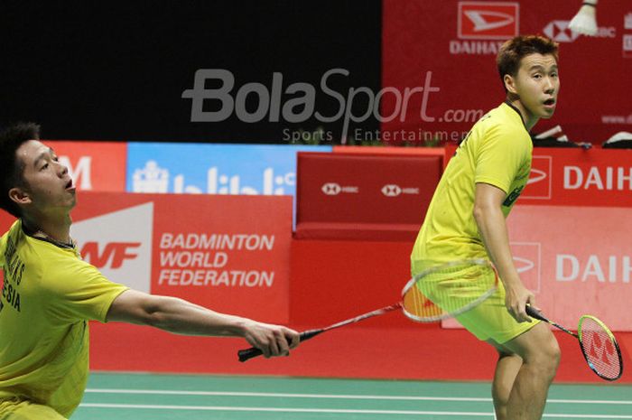 Pasangan ganda putra Indonesia, Marcus Fernaldi Gideon/Kevin Sanjaya Sukamuljo, pada final Indonesia Masters 2018 di Istora Senayan, Jakarta, Minggu (28/1/2018).