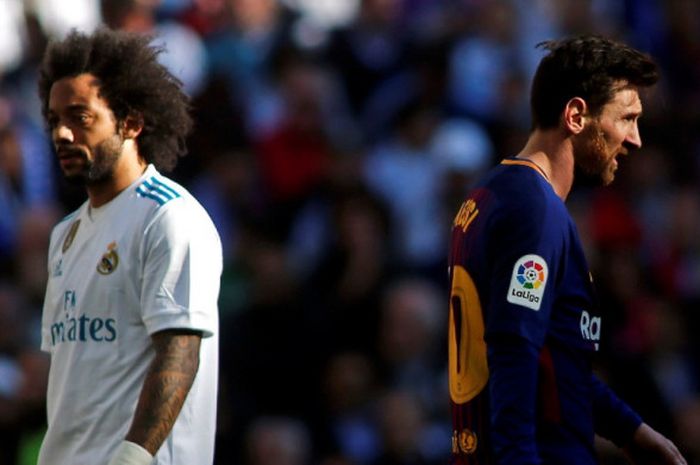 Ekspresi megabintang FC Barcelona, Lionel Messi (kanan), dan bek kiri Real Madrid, Marcelo, dalam laga Liga Spanyol di Stadion Santiago Bernabeu, Madrid, pada 23 Desember 2017.