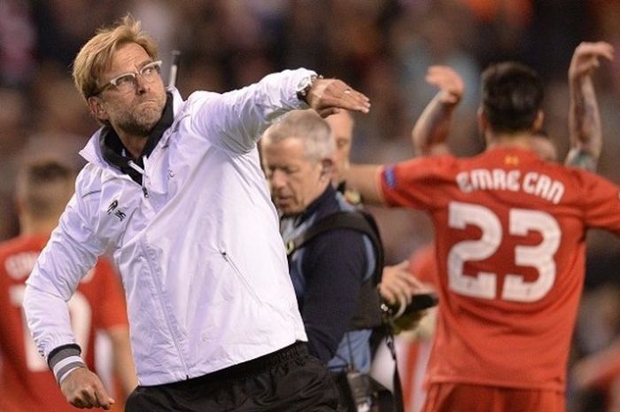 Manajer Liverpool, Juergen Klopp, melakukan selebrasi usai timnya dipastikan lolos ke final Liga Europa 2015-2016.