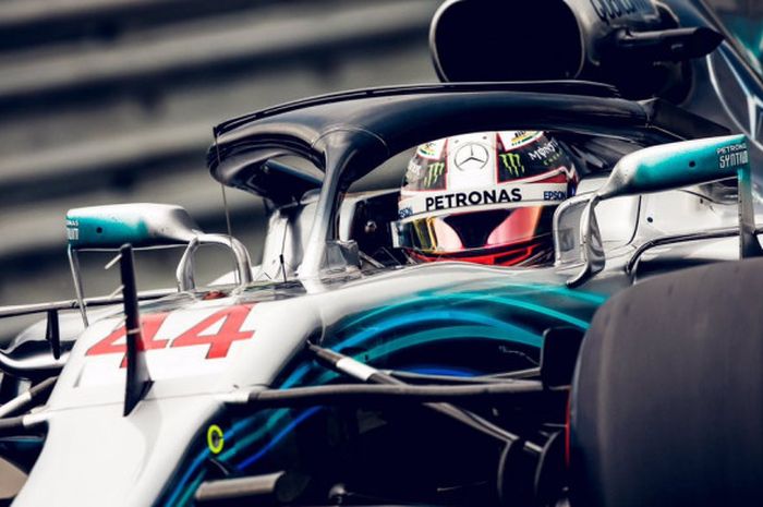 Lewis Hamilton (Mercedes) saat tampil dalam sesi balapan F1 GP Brasil 2018 yang digelar pada Senin (12/11/2018) dini hari WIB.