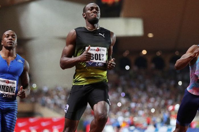 Pelari asal Jamaika, Usain Bolt, melintasi garis finish untuk menjuarai nomor 100 meter di IAAF Diamond League di Monako, 21 Juli 2017.