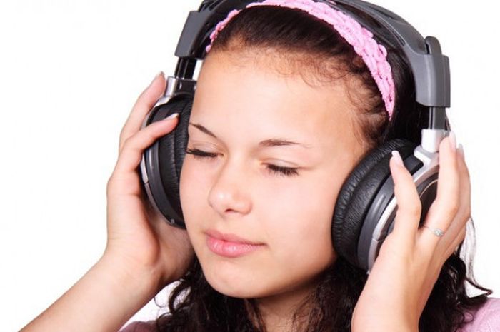 Manfaat mendengarkan musik saat olahraga