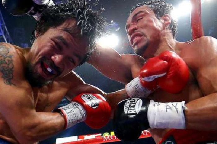 Manny Pacquiaon dan Juan Manuel Marquez.