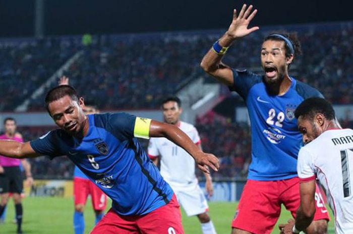  Salah satu momen dalam laga Persija kontra Johor Darul Takzim pada Grup H Piala AFC 2018 di di Stadion Larkin, Johor Bahru, Rabu (14/2/2018). 
