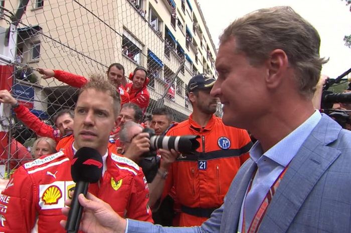 Sebastian Vettel sedang memberikan komentarnya atas hasil yang ia raih pada GP Monaco 2018, Minggu (27/5/2018).