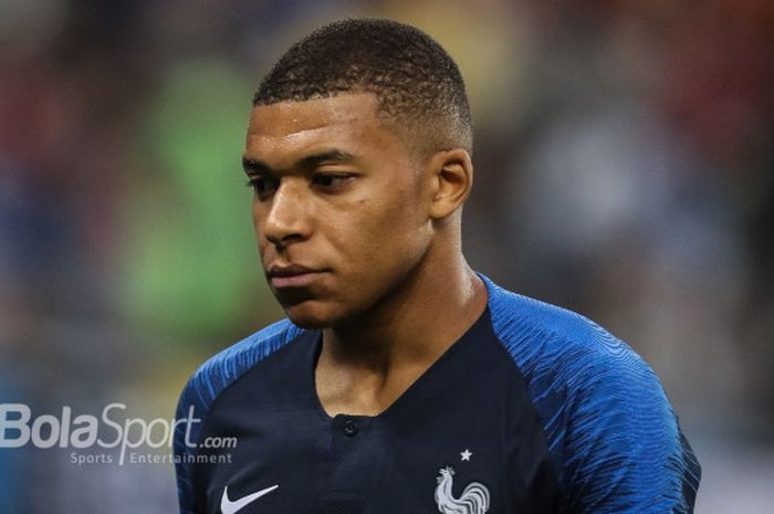   Ekspresi Kylian Mbappe dalam laga kontra Belgia, pada semifinal Piala Dunia 2018 di Saint-Petersburg Stadium, Selasa (10/7/2018)      