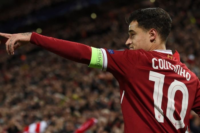 Gelandang Liverpool FC, Philippe Coutinho, merayakan gol yang dia cetak ke gawang Spartak Moskva dalam laga Grup E Liga Champions di Stadion Anfield, Liverpool, Inggris, pada 6 Desember 2017.