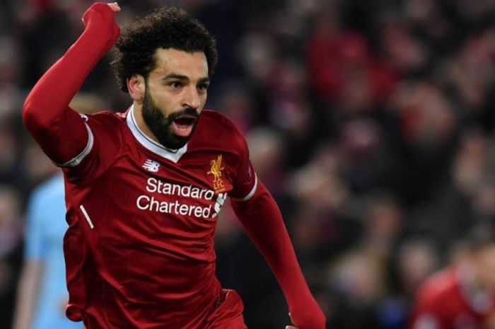   Ekspresi penyerang Liverpool, Mohamed Salah, seusai mencetak gol ke gawang Manchester City dalam laga Liga Champions di Stadion Anfield, Liverpool, 4 April 2018.  