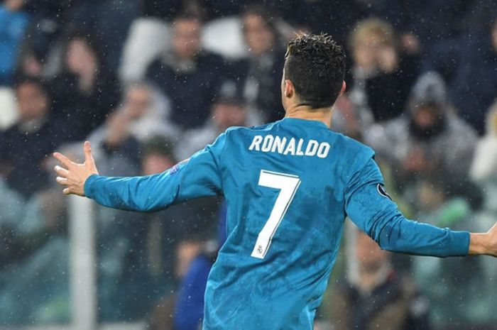 Megabintang Real Madrid, Cristiano Ronaldo, merayakan gol yang dicetak ke gawang Juventus dalam laga leg pertama perempat final Liga Champions di Stadion Allianz, Turin, Italia pada 3 April 2018.