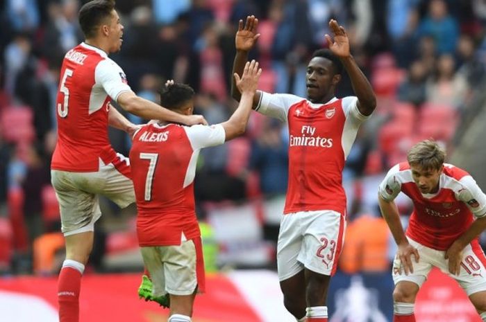 KEceriaan pemain Arsenal seusai mengalahkan Macnhester City pada semifinal Piala FA di Satdion Wembley, Minggu (23/4/2017)