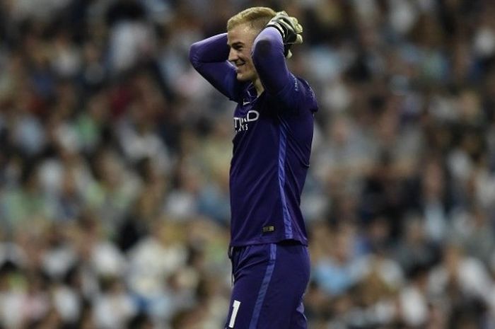 Ekspresi kekecewaan penjaga gawang Manchester City, Joe Hart, pada laga semifinal kedua kontra Real Madrid di Stadion Santiago Bernabeu, Rabu (4/5/2016) waktu setempat.