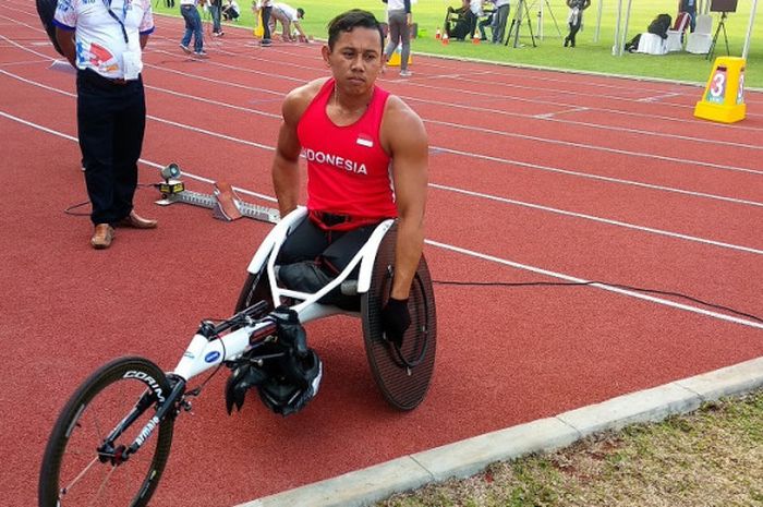 Atlet difabel Indonesia, Jaenal Aripin, seusai menjalani lomba pada test event Asian Para Games 2018, di Stadion Madya, Senayan, Jakarta, Sabtu (30/6/2018).