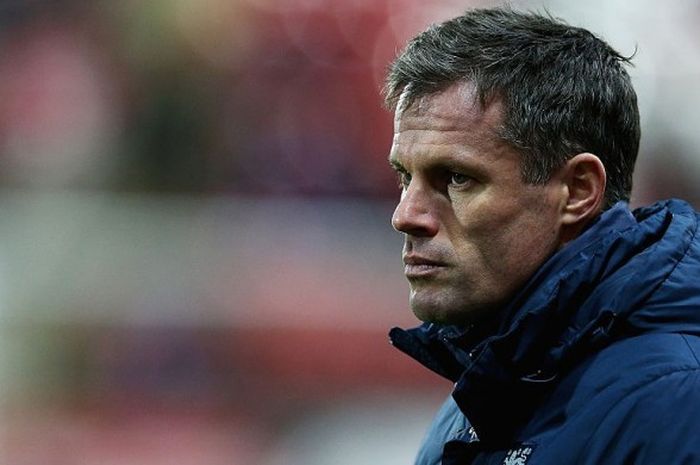 Jamie Carragher saat membantu pelatih tim nasional Inggris U-17, Steve Cooper, saat menghadapi Jerman di pertandingan persahabatan di New York Stadium, Rotherham, Inggris, pada 20 November 2015.