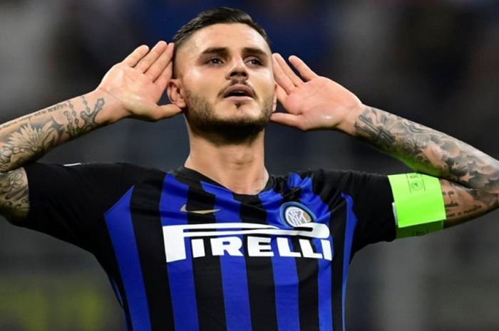  Reaksi striker Inter Milan, Mauro Icardi, setelah mencetak gol ke gawang Tottenham dalam partai Liga Champions di Giuseppe Meazza, Milan, 18 September 2018. 