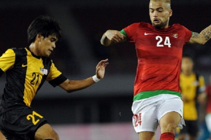 Diego Michiels tampil membela timnas Indonesia di SEA Games 2013 kontra Malaysia.