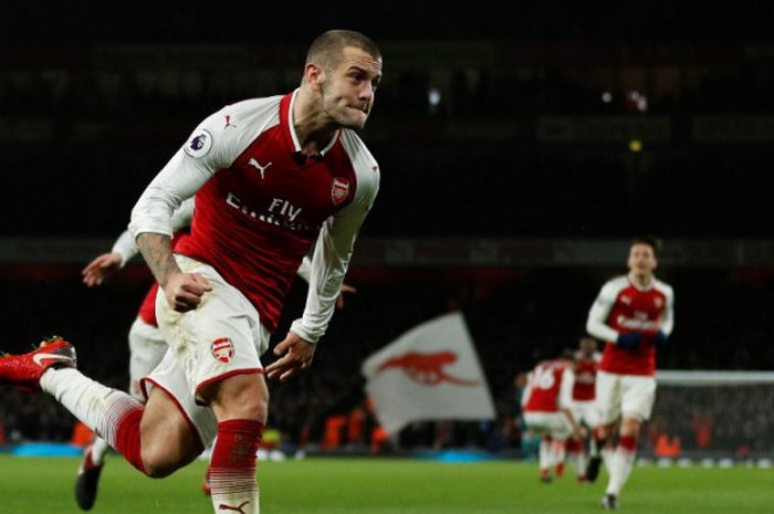     Gelandang Arsenal, Jack Wilshere, merayakan gol yang dia cetak ke gawang Chelsea dalam laga Liga Inggris di Stadion Emirates, London, pada 3 Januari 2018.    