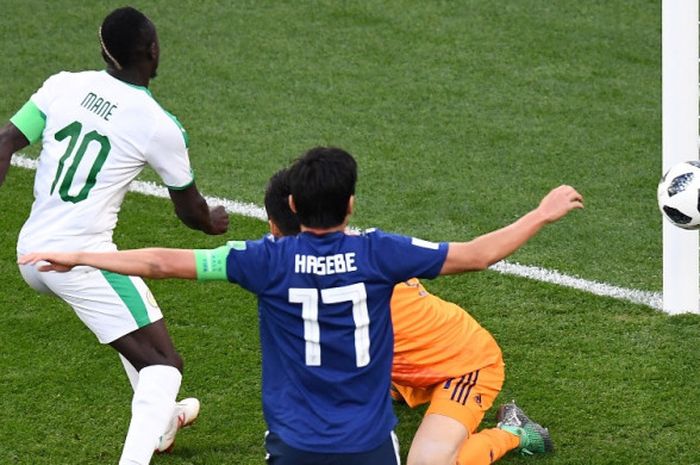  Proses gol yang diciptakan Sadio Mane ke gawang Jepang pada laga penyisihan Grup H Piala Dunia 2018 di Ekaterinburg Arena, Minggu (24/6/2018). 