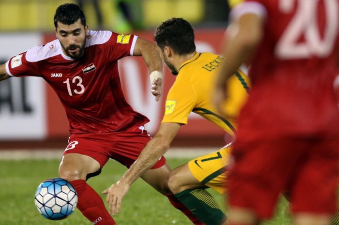 Salah satu momen pada leg pertama kualifikasi Piala Dunia zona Asia antara Suriah vs Australia, Kamis (5/10/2017). Pertemuan pertama ini berakhir imbang 1-1.