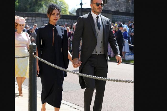 Victoria Beckham bersama David Beckham saat tiba di Kastil Windsor, London