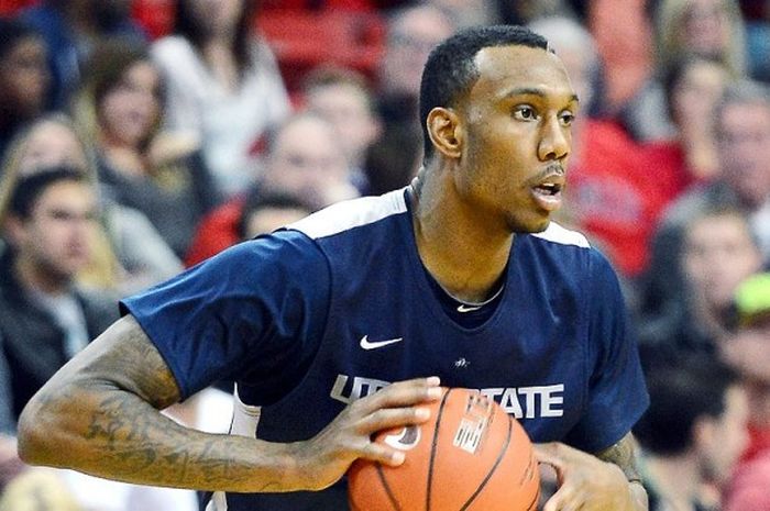 Pemain Utah State Aggies, Jarred Shaw, saat tampil melawan UNLV Rebels di Stadion Thomas & Mack Center, Las Vegas, pada 22 Januari 2014.