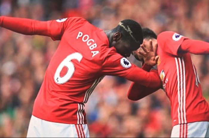 Paul Pogba melakukan selebrasi dab dance