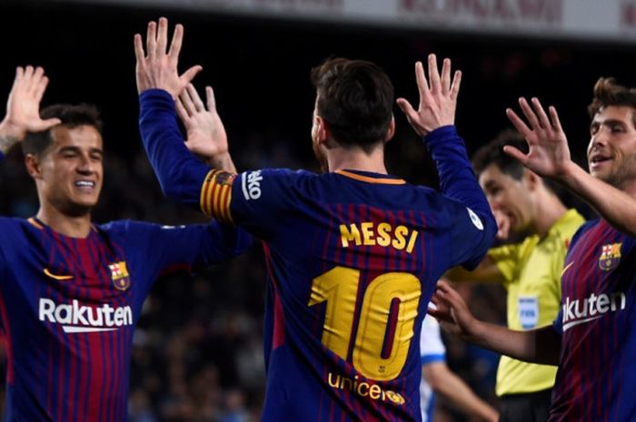Lionel Messi (tengah) merayakan golnya untuk Barcelona ke gawang Leganes dalam partai Liga Spanyol di Camp Nou, Barcelona, 7 April 2018.