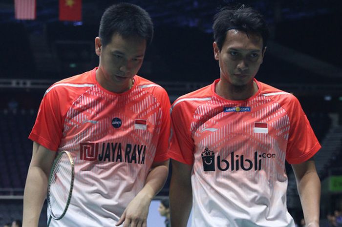 Pasangan ganda campuran, Mohammad Ahsan/Hendra Setiawan saat tampil pada ajang Singapore Open 2018 di Singapore Indoor Stadium, Singapura, Rabu (18/7/2018).