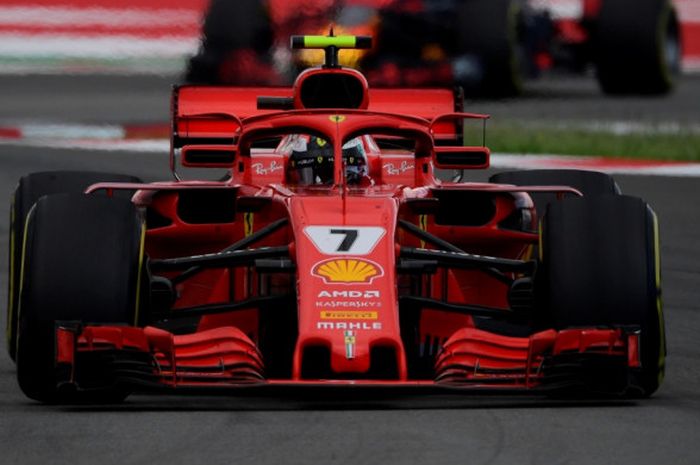 Pebalap Ferrari dari Finlandia, Kimi Raikkonen, saat menjalani balapan GP Spanyol di Circuit de Catalunya, Montmelo, Barcelona, Minggu (13/5/2018).