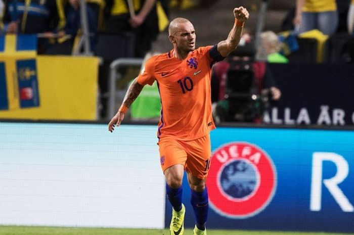 Gelandang Belanda, Wesley Sneijder, merayakan gol yang dia cetak ke gawang Swedia dalam pertandingan Kualifikasi Piala Dunia 2018 di Friends Arena, Solna, Swedia, 6 September 2016.