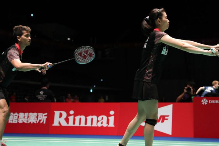 Pasangan ganda campuran Ricky Karanda Suwardi/Debby Susanto saat tampil pada babak pertama Japan Open 2018 di Musashino Forest Sport Plaza, Tokyo, Jepang (12/9/2018).