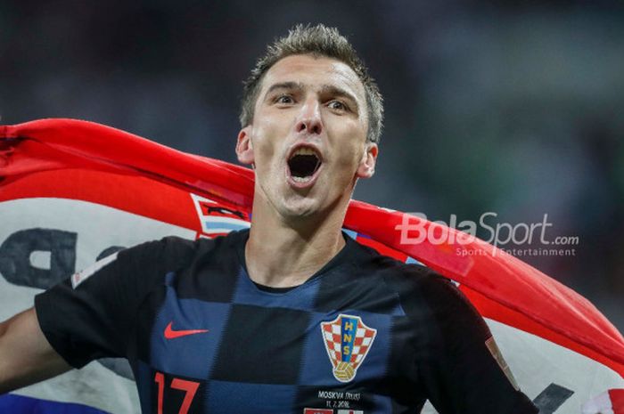 Ekspresi penyerang Kroasia, Mario Mandzukic, setelah timnya lolos ke final Piala Dunia 2018 dan mengalahkan Inggris di Stadion Luzhniki, Kamis (12/7/2018).