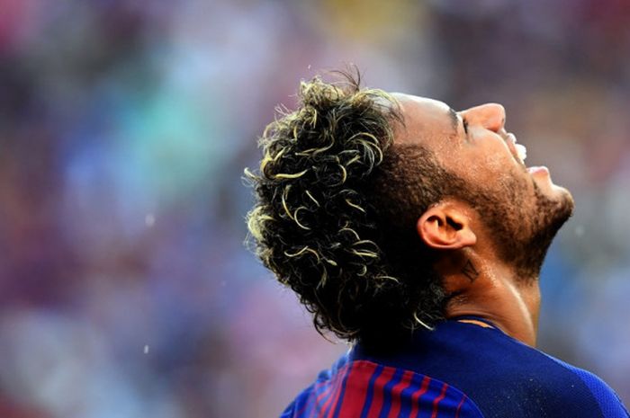 Reaksi striker FC Barcelona, Neymar, dalam laga International Champions Cup kontra Juventus di MetLife Stadium, New Jersey, Amerika Serikat, pada 22 Juli 2017.