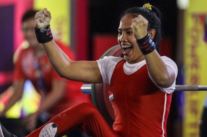 Para Powerlifter Indonesia, Ni Nengah Widiasih, saat tampil pada ajang Asian Para Games 2018.