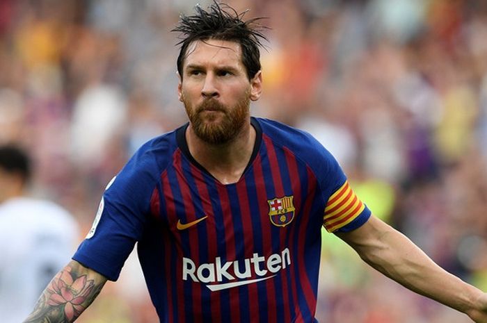  Megabintang FC Barcelona, Lionel Messi, merayakan gol yang dicetak ke gawang SD Huesca dalam laga Liga Spanyol di Stadion Camp Nou, Barcelona pada 2 September 2018. 