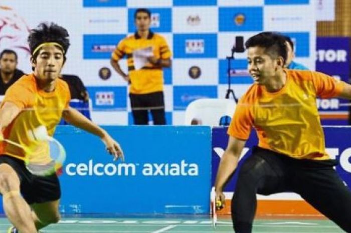 Pasangan ganda putra Malaysia, Nur Mohd Azriyn Ayub Azriyn (kiri) bersama Mohamad Arif Abdul Latif (kanan), berhasil melenggang ke babak dua India Open 2019 meski sambil menahan sakit lantaran sempat alami kecelakaan.