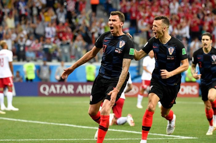 Penyerang Kroasia, Mario Mandzukic, merayakan golnya ke gawang Denmark dalam laga babak 16 besar Piala Dunia 2018 di Nizhny Novgorod Stadium, Nizhny Novgorod, Rusia pada 1 Juli 2018.  