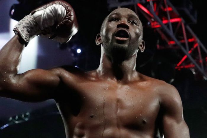 Terence Crawford (Amerika Serikat) lakukan selebrasi setelah berhasil mengalahkan Jeff Horn (Australia) pada pertandingan yang digelar di Las Vegas, Amerika Serikat pada Sabtu (9/6/2018)