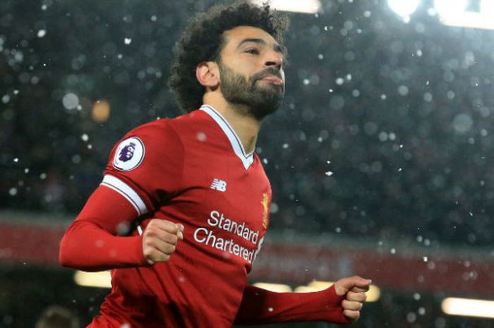  Winger Liverpool, Mohamed Salah, usai mencetak gol ketiganya ke gawang Watford pada lanjutan laga Liga Inggris pekan ke-31 di Stadion Anfield, pada Sabtu (17/3/2018) atau Minggu dini hari WIB. 